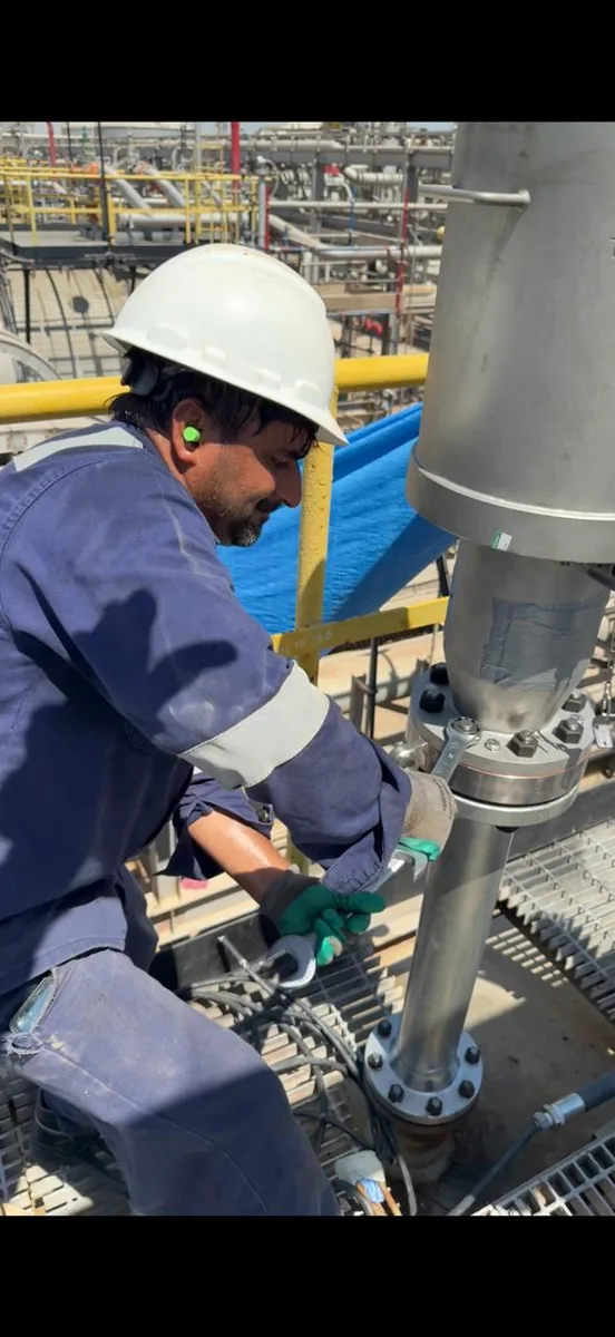 Technician servicing a nucleonic profiler at a process plant