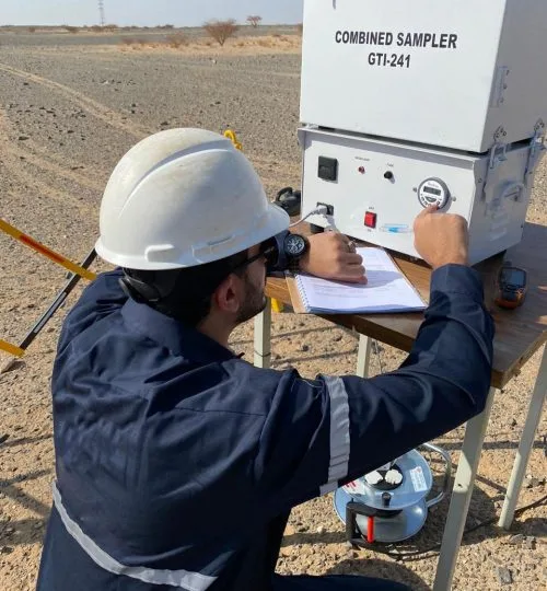 Field technician recording readings from a sampling instrument
