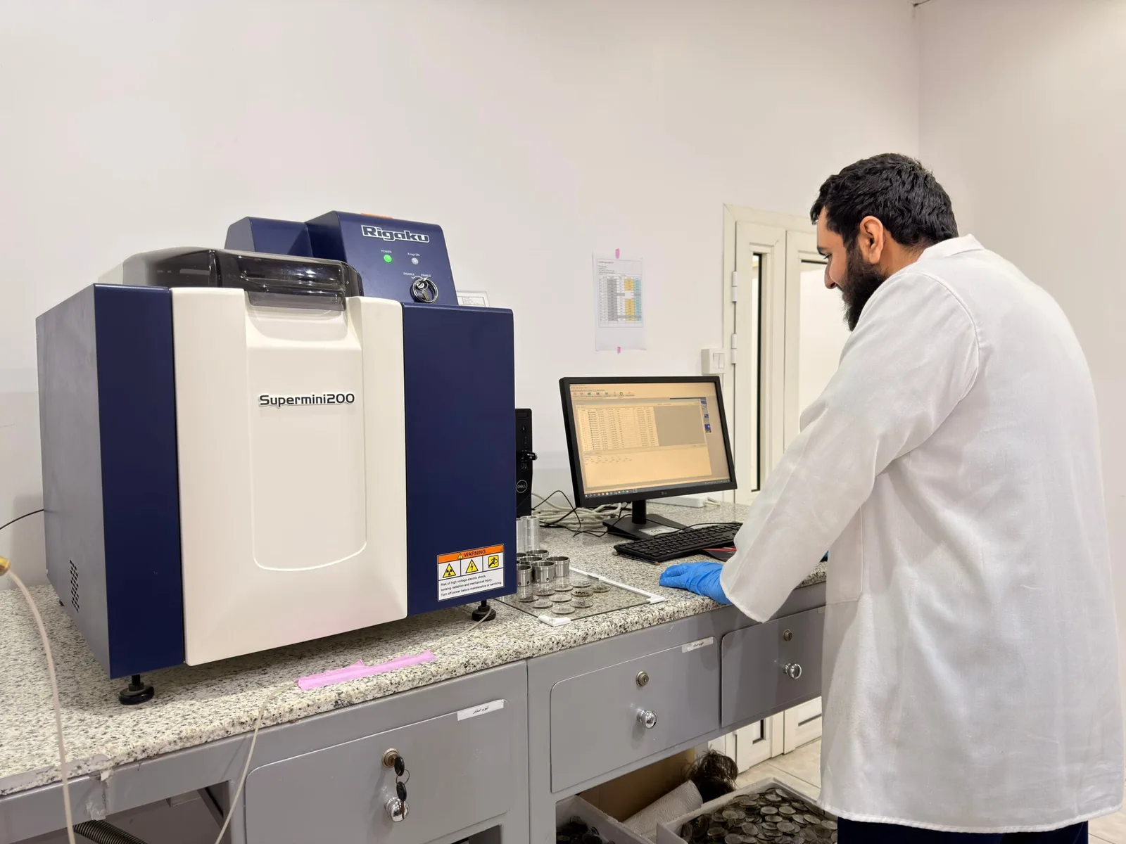 Analyst at the spectrometry bench