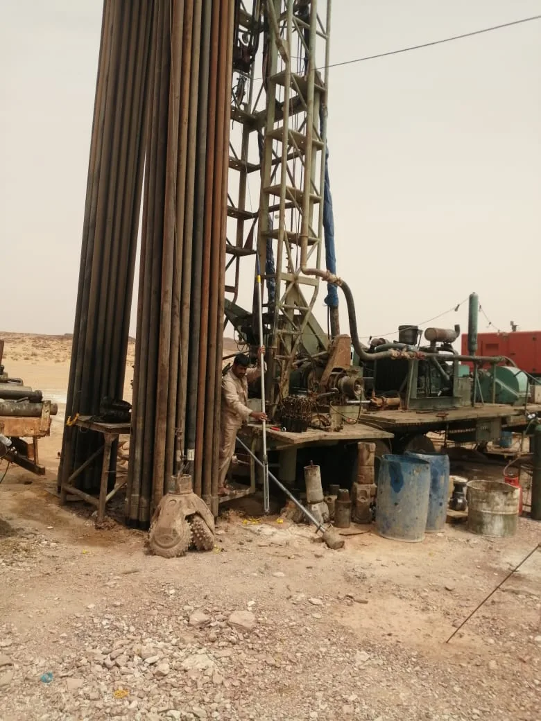 Water-well drilling rig operating in the field
